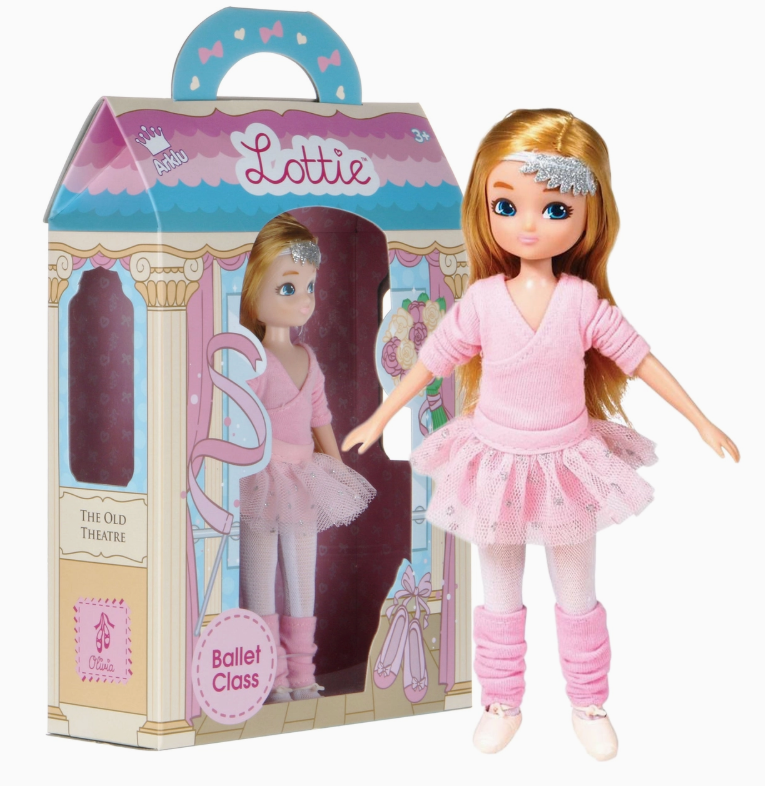 A lootie dolls Lottie Dolls - Ballet Classes doll is dressed in a pink ballet outfit and comes in a theater-themed box with a clear window and “Lottie” and “Ballet Class” on the front.