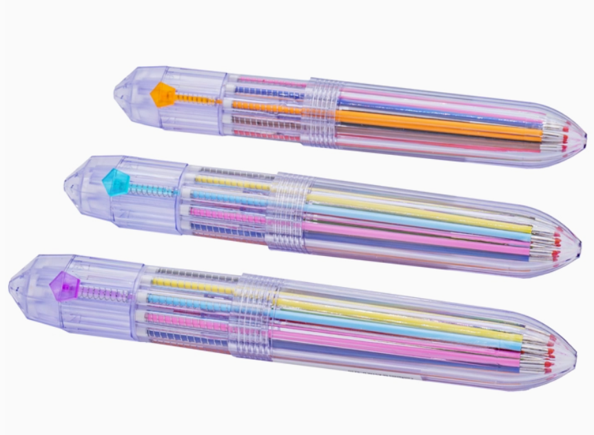 Three Sensory Lab Colorclik Pens by Toy Smith feature transparent cylindrical cases with faceted gem-like ends and central ridges, each neatly filled with multiple colorful pencils inside.
