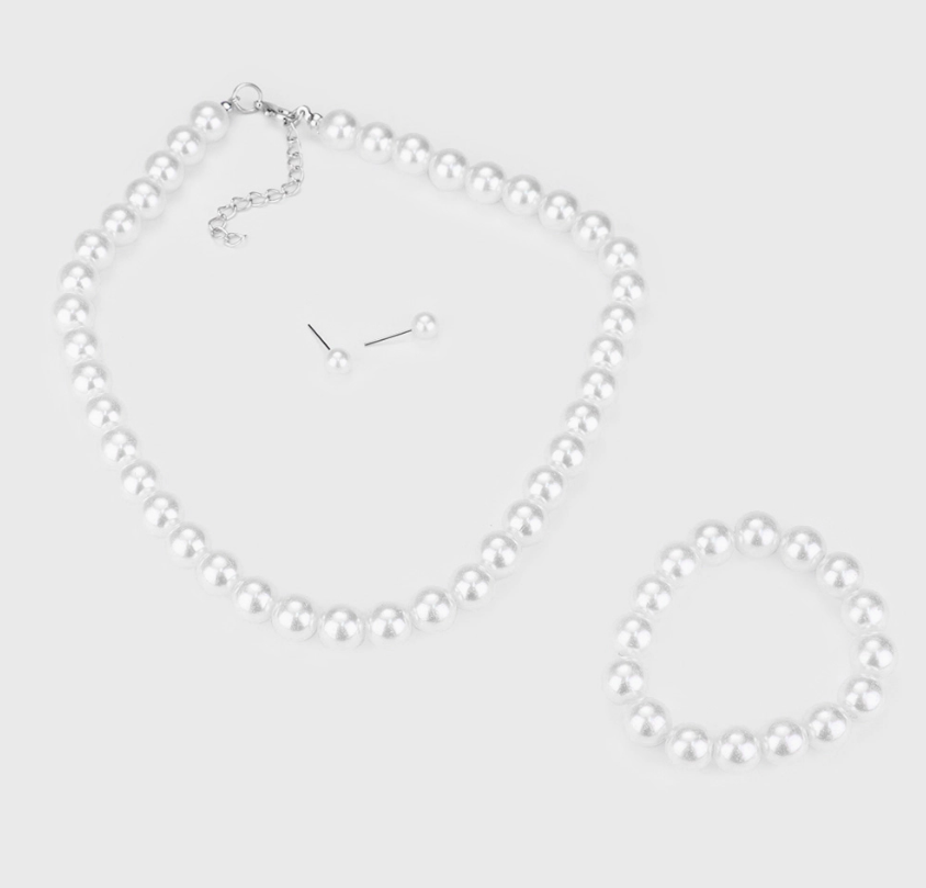 The Little Pearl Darling Set by Sensibling Corp. features a white pearl necklace, bracelet, and stud earrings displayed on a light background.