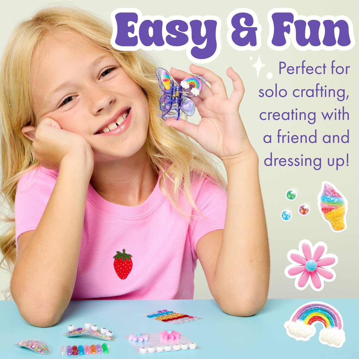 A smiling girl in a pink shirt holds a vibrant butterfly craft, surrounded by beads and crafting supplies—including pieces from the Faber-Castell / Creativity for Kids Chic Boutique DIY Hair Clip Kit for Kids. The text reads: “Easy & Fun. Perfect for solo crafting, making with a friend, and accessorizing with butterfly claw clips—ideal for girls ages 6–8!” Colorful decorative icons complete the creative scene.