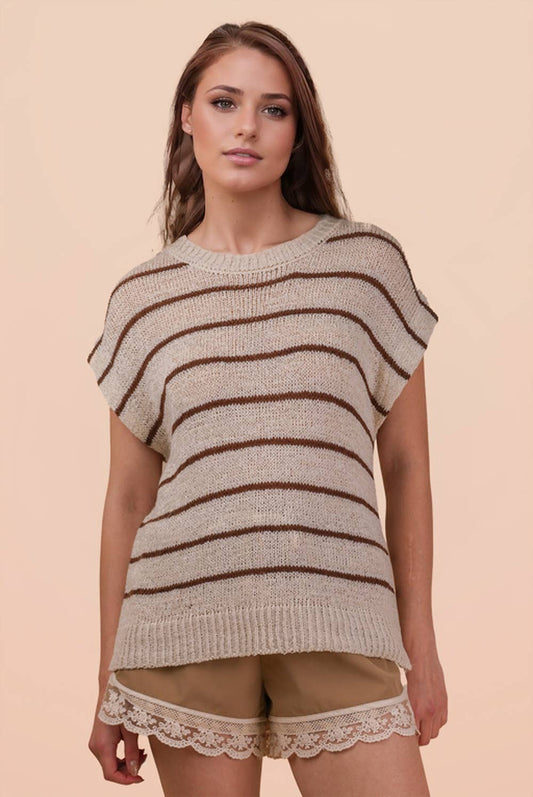A person wearing a VERY J Striped Knit Sweater Vest Top in beige with brown horizontal stripes.