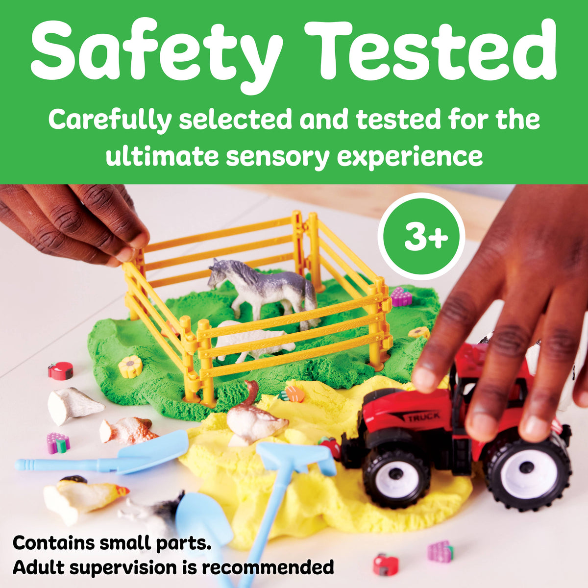 Two hands play with the Sensory Pack Farm On the Go Sensory Play Set for Kids by Faber-Castell / Creativity for Kids, featuring a toy horse pen, small farm animals, and a red toy tractor on a colorful sensory play mat. Text reads: Safety Tested. Ages 3+. Contains small parts. Adult supervision is recommended.