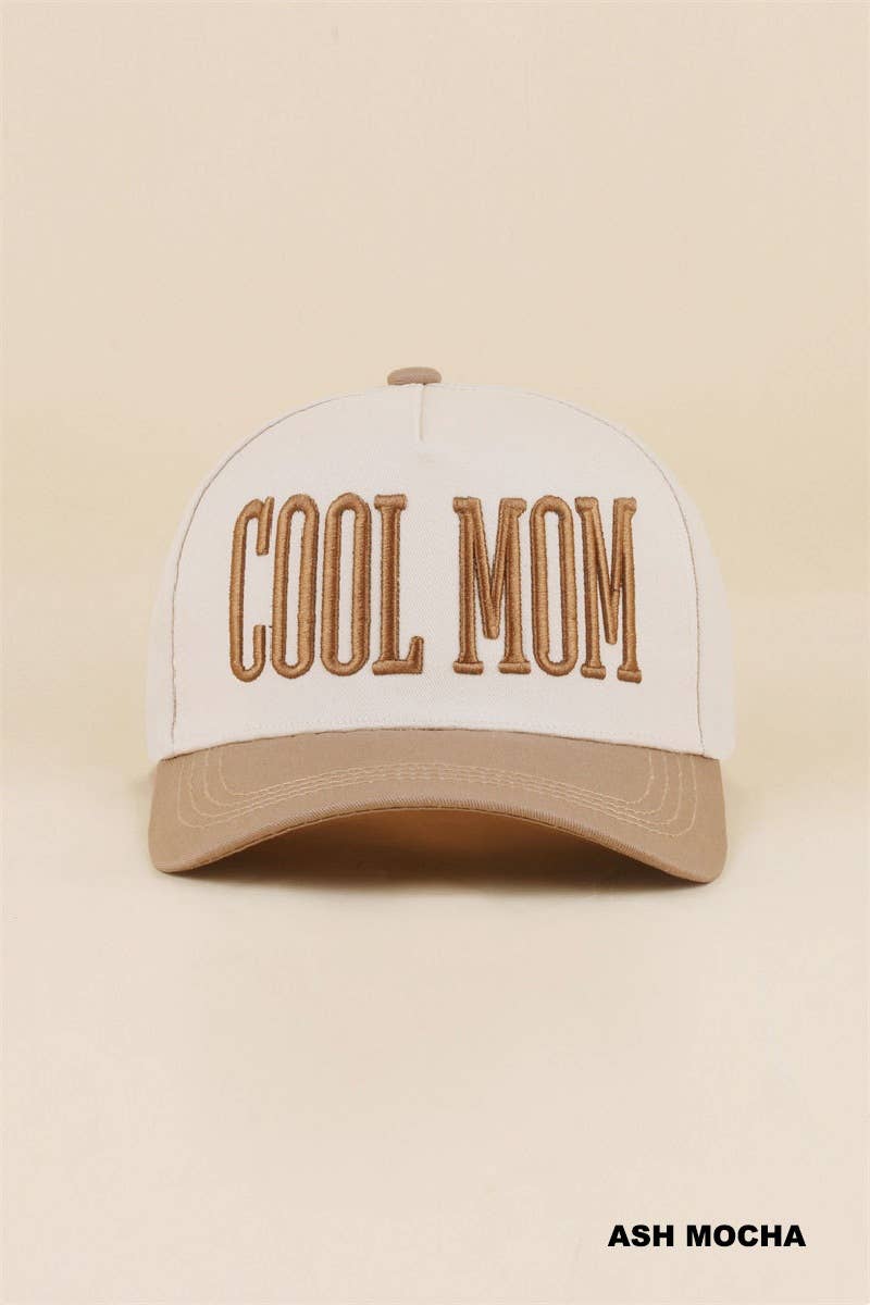 A Cool Mom Two Tone Snapback Hat by 42POPS, featuring beige and tan panels with “COOL MOM” embroidered in large brown letters on the front. The color “ASH MOCHA” is indicated in the bottom right corner.