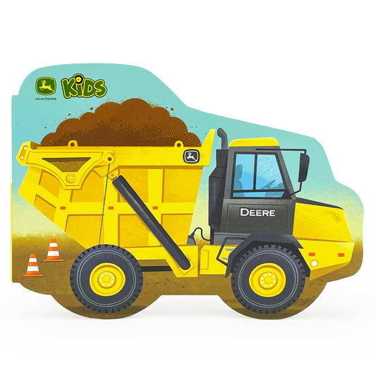 Illustration from the John Deere Kids How Dump Trucks Work Shaped Board Book by Cottage Door Press features a yellow dump truck labeled DEERE, filled with dirt, accompanied by two orange traffic cones and the John Deere Kids logo in the top left corner. The light blue and brown background creates a perfect construction scene for preschoolers or any young fan who loves dump trucks.
