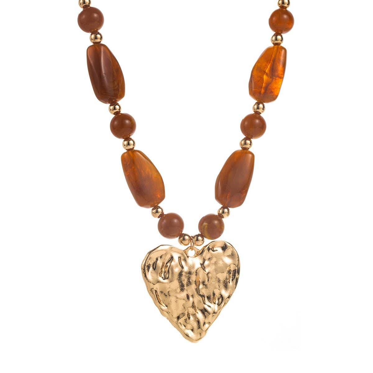 A Hammered Heart Pendant Necklace by JOSSLYN by wall to wall, featuring amber-colored beads and a large, textured gold heart-shaped pendant.