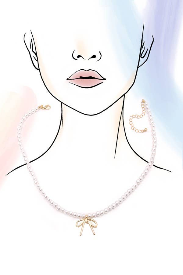A minimalist illustration of a woman’s face and neck features the JOSSLYN by wall to wall Pearl Chain Bow Charm Necklace, showcasing a delicate gold bow pendant clasped elegantly around her neck.