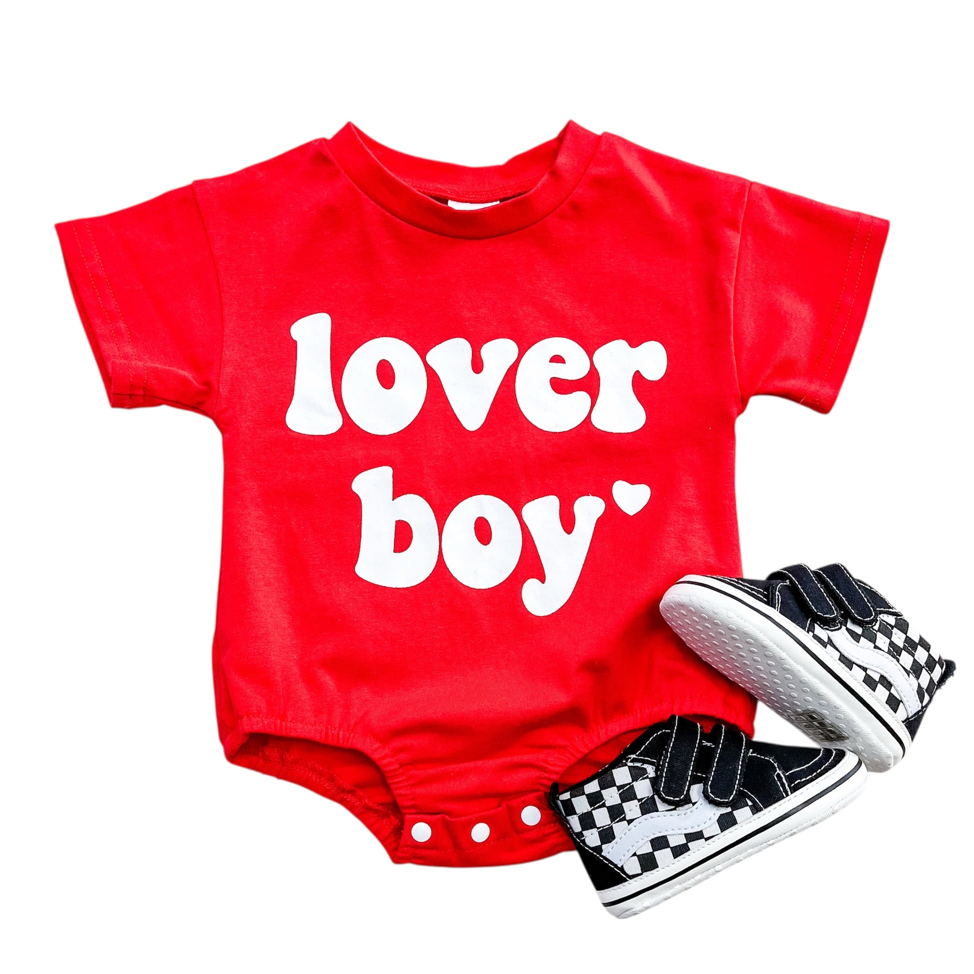 The Red Lover Boy Bubble by Tiny Tot Bundles features bold white "lover boy" lettering, displayed with black and white checkerboard baby sneakers on a white background.