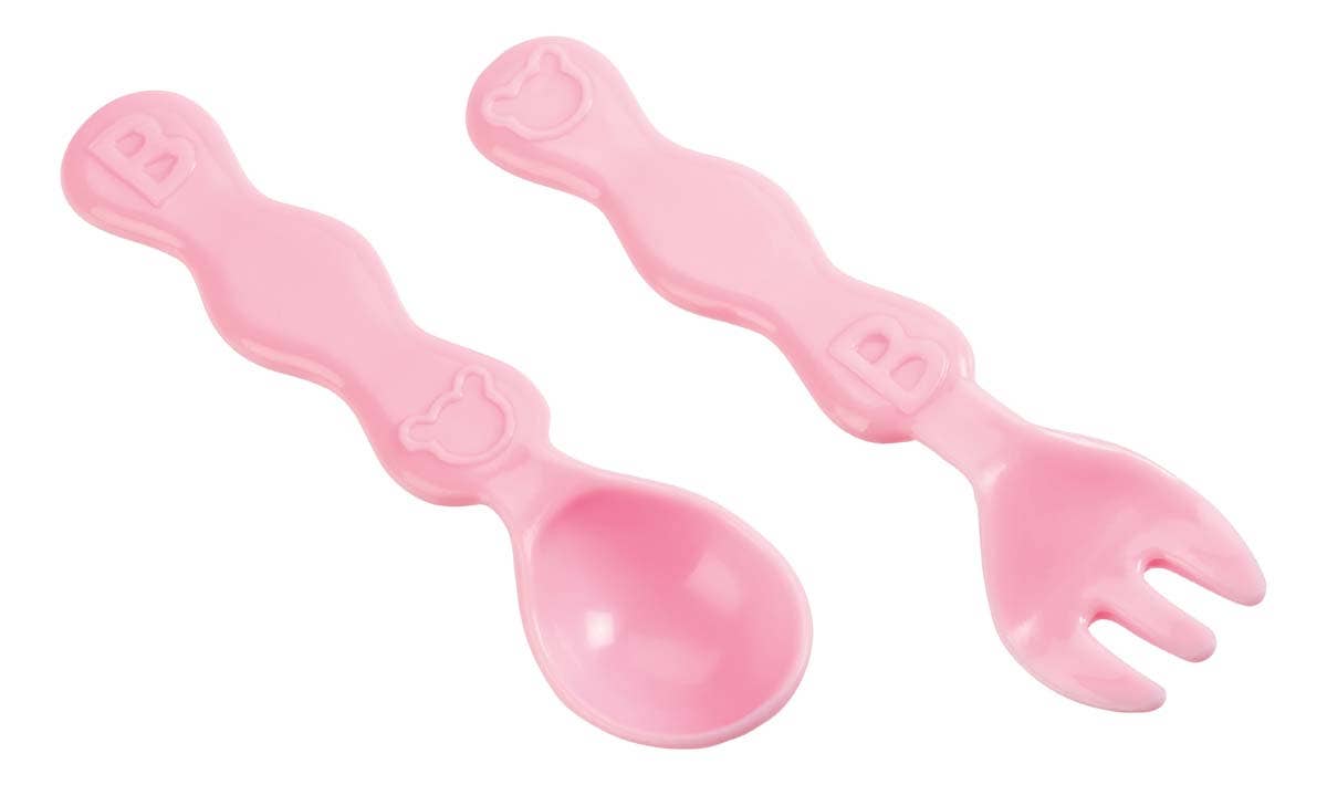 Two pink plastic baby utensils—a spoon and a fork with wavy handles and embossed designs—lie side by side on a white background, making them perfect accessories for the My Sweet Baby Deluxe Baby Ensemble 12-Piece Doll Playset by Toysmith, ideal for any pretend play session.