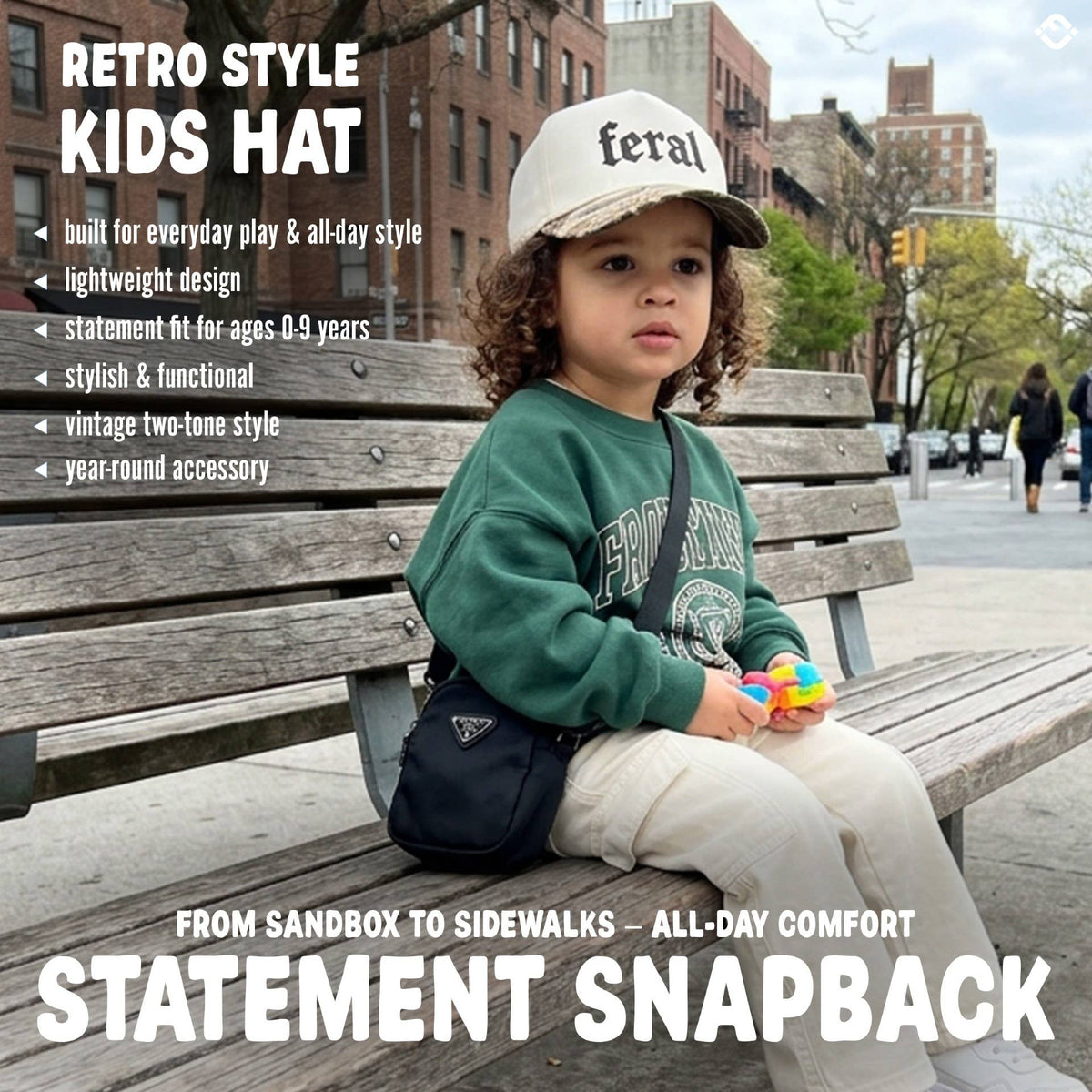 A child wearing a Feral 2-Tone Hat sits on a park bench.