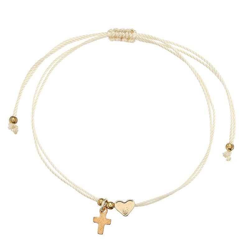 Introducing the Heart Thread Bracelet Display – The Power of the Cross by Faithworks by Creative Brands: a white cord bracelet adorned with gold-tone cross and heart charms, featuring adjustable knots and gold bead accents at each end.