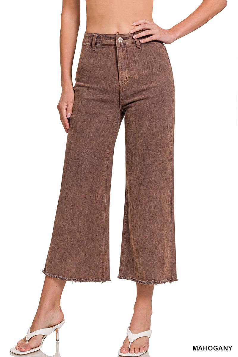 A person wearing the 42POPS Mocha Straight Leg Wide Pants, featuring a high-waisted, wide-leg, cropped silhouette with raw hems, paired with white heeled sandals and standing against a white background.