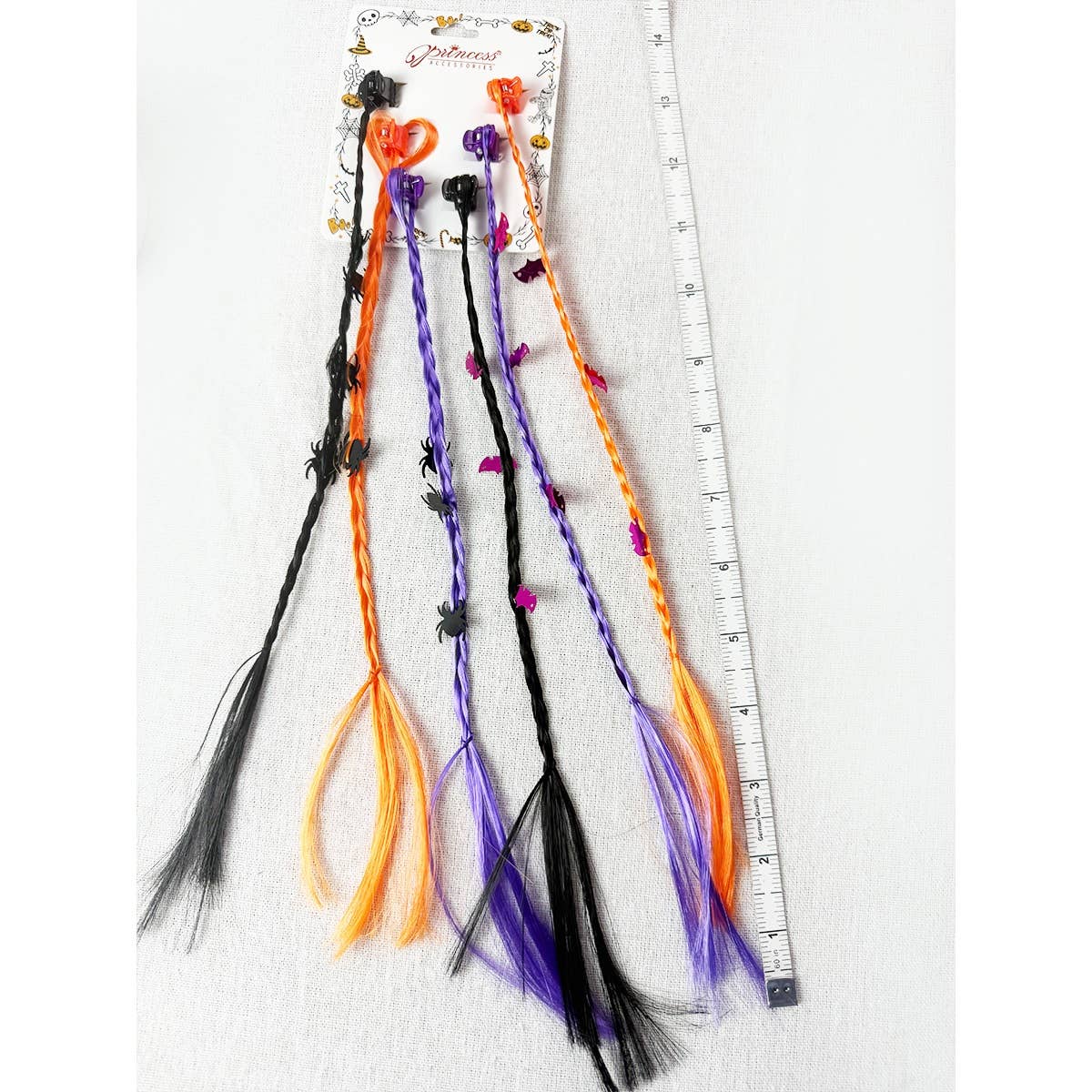 Love and Repeat Halloween Braid Hair Extension Clips in orange, black, and purple, decorated with small plastic spiders and bats.