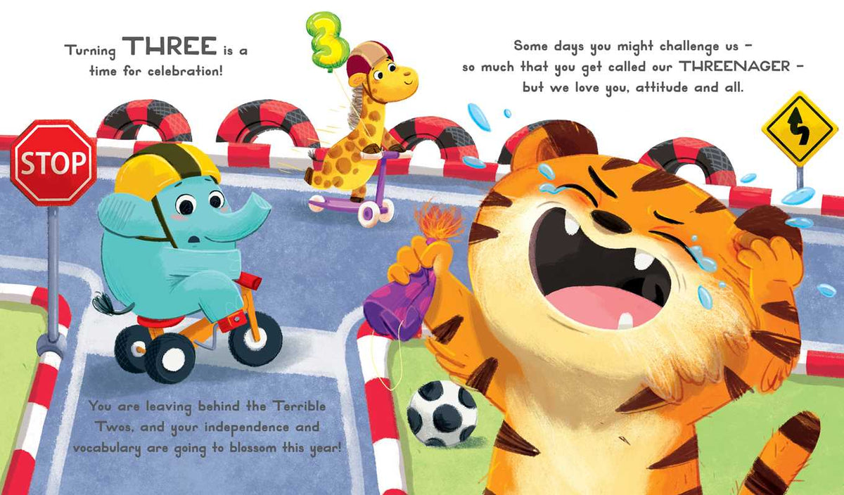 At a racetrack-themed birthday, a joyful tiger holds a party favor, an elephant rides a scooter, and a giraffe carries a 3 balloon. Playful details surround this cheerful scene from Simon & Schuster’s Now You Are 3 Book.