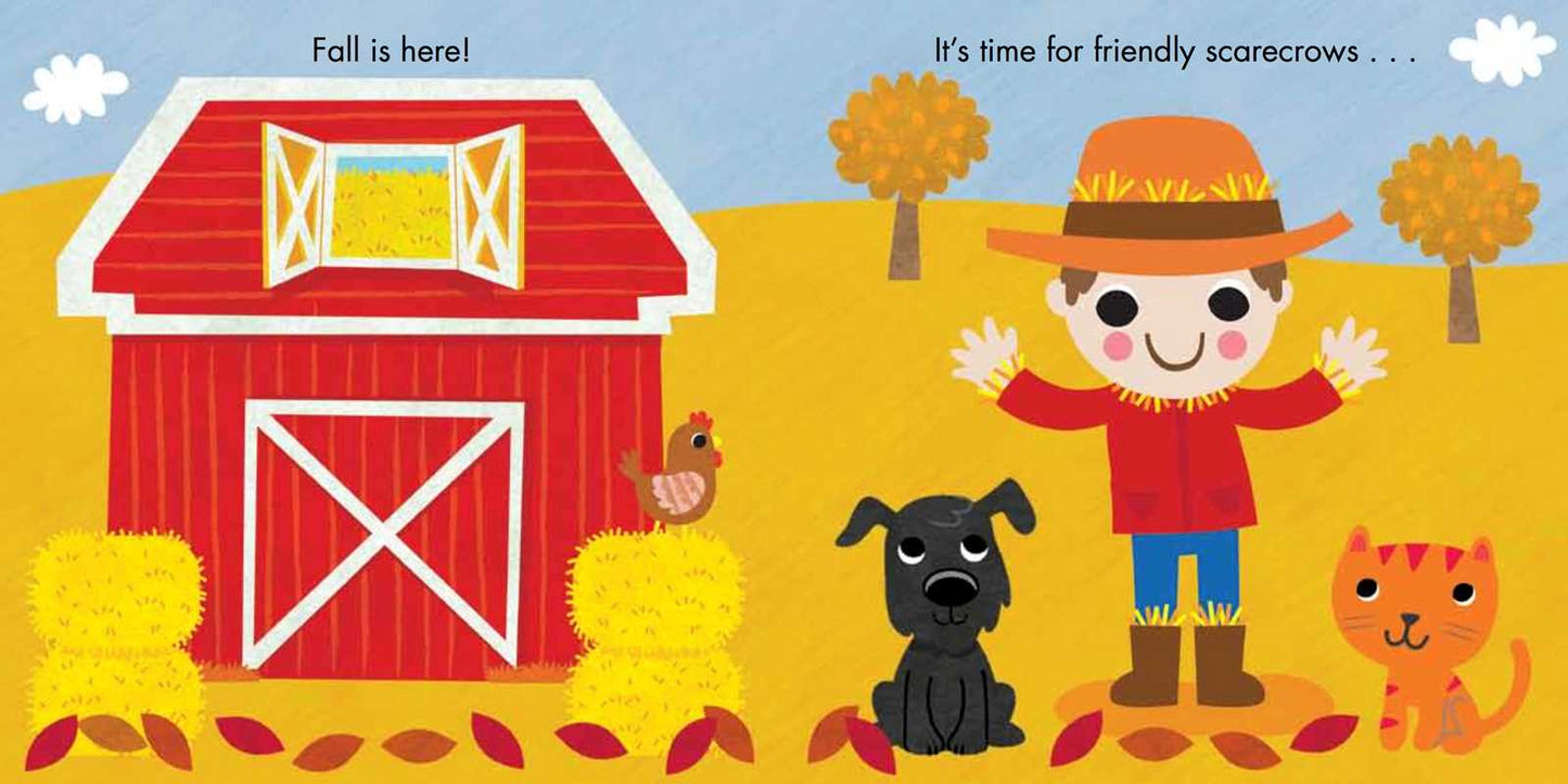 A cheerful scarecrow waves beside a red barn, surrounded by a black dog, orange cat, chicken, hay bales, and colorful autumn trees. The Fall Is Here! Book from Simon & Schuster celebrates the spirit of the season with friendly scarecrows and festive farmyard friends.