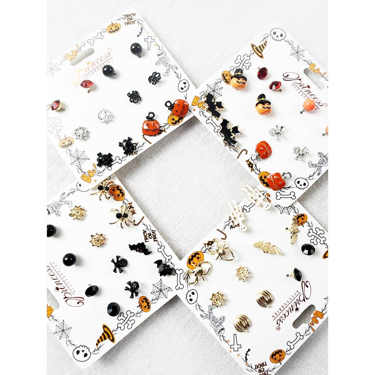 Cute Halloween Theme Earring Set featuring four display cards of assorted stud earrings including pumpkins, ghosts, bats, spiders, and skulls.