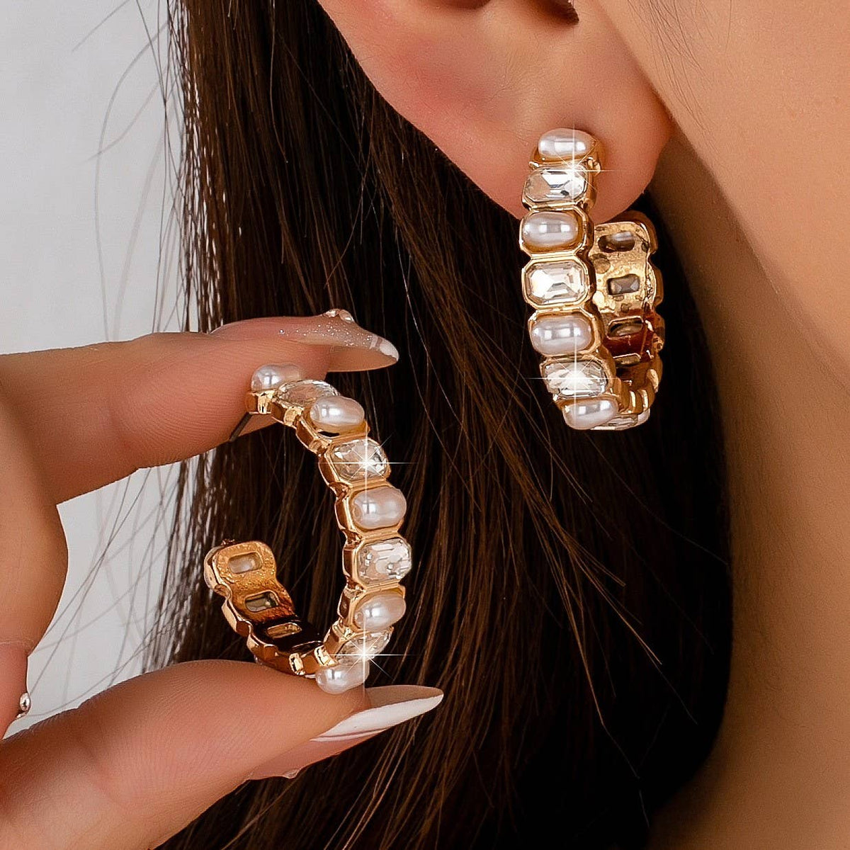 JOSSLYN by wall to wall Pearl & Rhinestone Hoop Earrings in gold, featuring alternating oval pearls and clear rectangular rhinestones.