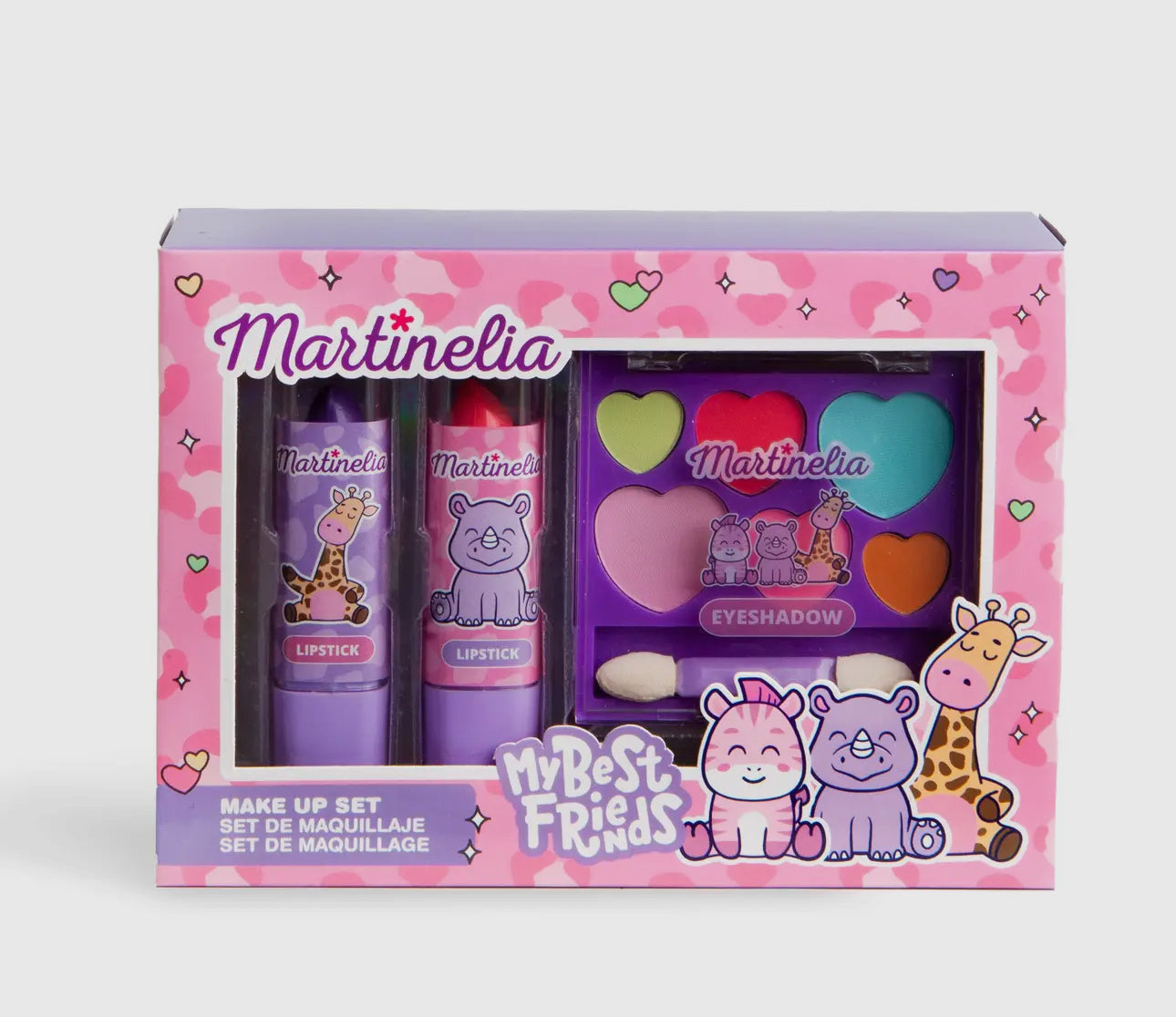 The Toy Smith Martinelia My Best Friends Makeup Set comes in a pink box with animal designs, featuring two lipsticks, a multi-color eyeshadow palette, an applicator, and “Martinelia” on the packaging.
