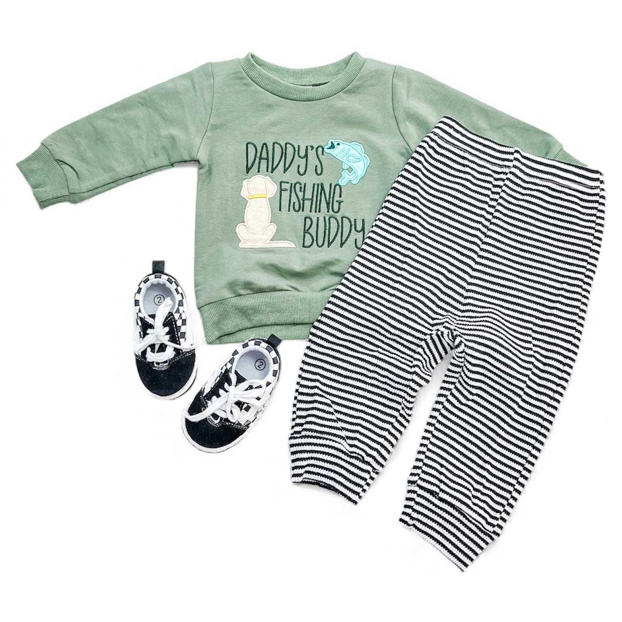The Daddy's Hunting Buddy Set by Tiny Tot Bundles includes a green sweatshirt with "Daddy's Hunting Buddy" and a graphic, plus black-and-white striped pants and matching sneakers.