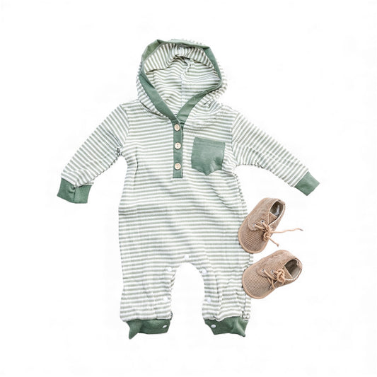 The Tiny Tot Bundles Sage Hooded Romper, featuring green and white stripes, a chest pocket, and buttons, is paired with tan baby shoes and displayed on a white background.