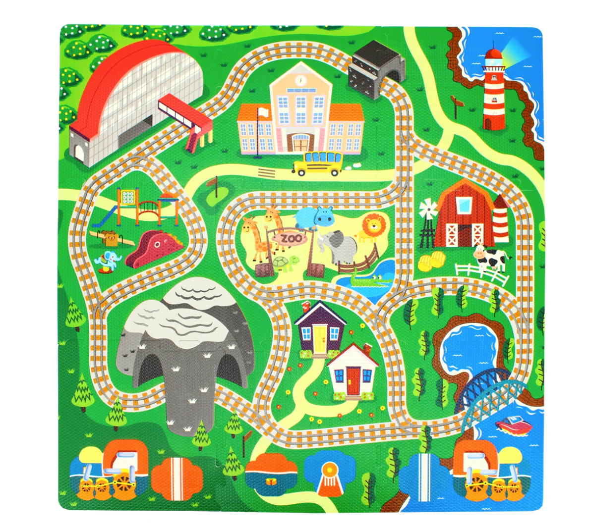 The Triaction Train & Track Play Mat features a colorful train track, zoo animals, a playground, houses, school, barn, lighthouse, pond with bridge, trees, and picnic tables on a vibrant green background.