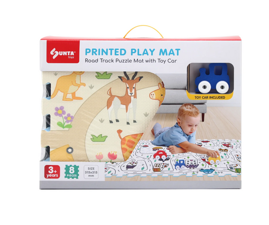 The Triaction Safari Play Mat is a boxed puzzle mat for ages 3+, with animal designs, a road track, and a blue toy car included. Packaging shows a child playing on the mat.