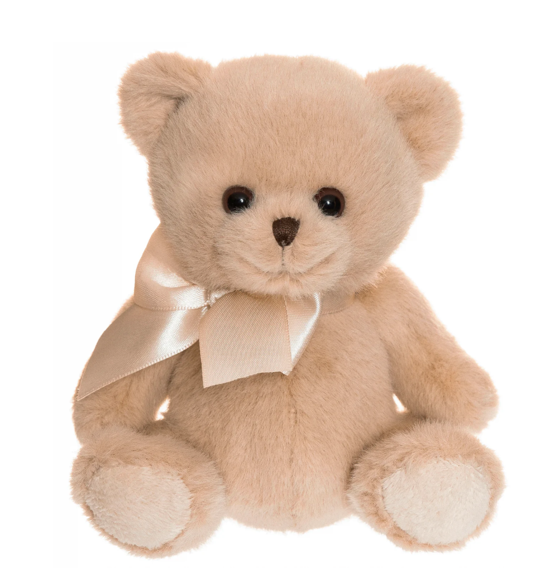 The Triaction Teddy Besties Companion is a small, light brown teddy bear with round black eyes, a stitched nose, and a white satin ribbon bow around its neck, shown sitting against a white background.