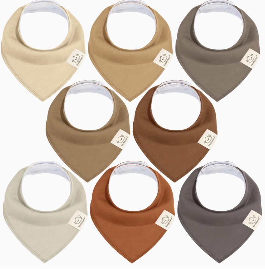 The keaBabies 8-pack Baby Bandana Bibs - Terracotta features bibs in neutral colors like tan, brown, cream, taupe, gray, and rust. Each bib has a beige logo tag on the left side. Bibs are arranged in two rows of four.