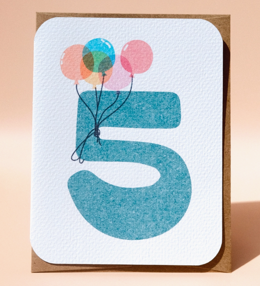 The 5th Birthday Card by Paper Chain Studios features a large blue number 5 with five colorful balloons on a textured white background, rounded corners, and a brown border.