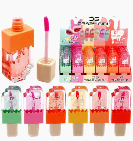 Capzone Popsicle Magic Tint Lip Gloss tubes in orange, pink, red, and green, including one open to show the applicator; a branded display box appears in the background.
