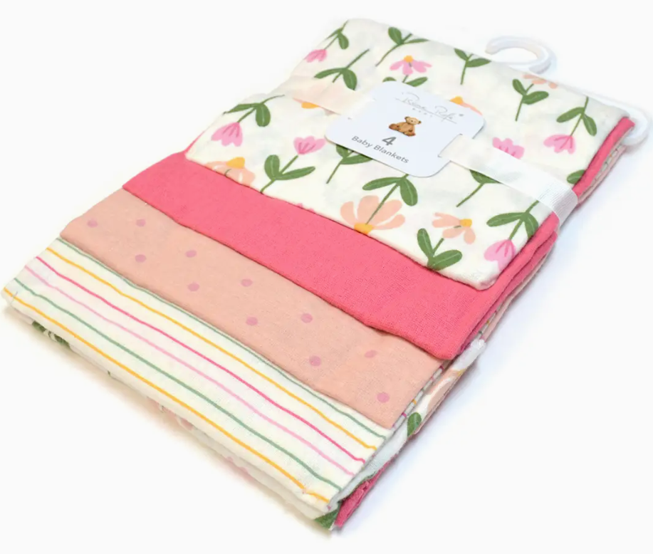 The Lollipop Dreams Garden Girl Blanket Pack includes four folded baby blankets in floral, solid pink, polka dot, and striped designs, bundled with a white ribbon and label.