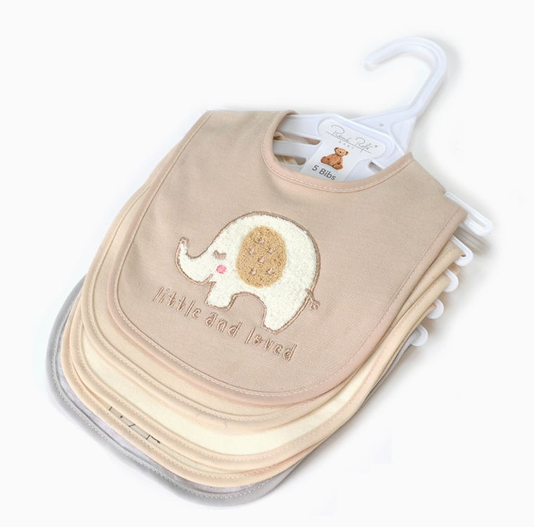 The Lollipop Dreams Little & Loved Bib Set includes five beige and cream baby bibs with an embroidered elephant and "little and loved" text, neatly displayed on a white hanger.