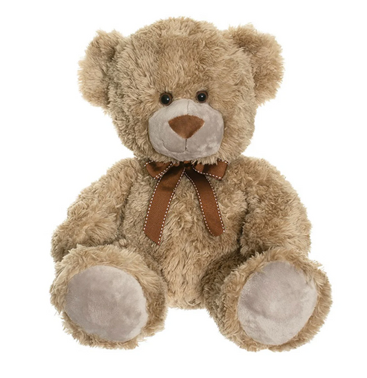 Roger The Bear by Triaction is a light brown, fluffy teddy bear with a darker brown nose, round black eyes, beige paws, and a brown ribbon bow around its neck, sitting upright against a white background.