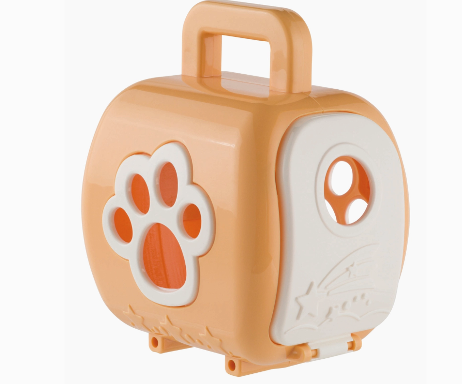 The Toy Smith Farm Fresh Carry-Along Critters is a small orange and white plastic pet carrier with a handle, paw print cut-out, and circular front window—ideal for Bitty Buddies or animal figurines.