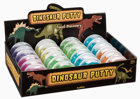 A Toy Smith Dino Discovery Putty display box holds small, round containers of colorful sensory putty. Featuring dinosaur artwork, it’s recommended for ages 5+ and makes a unique party favor!.