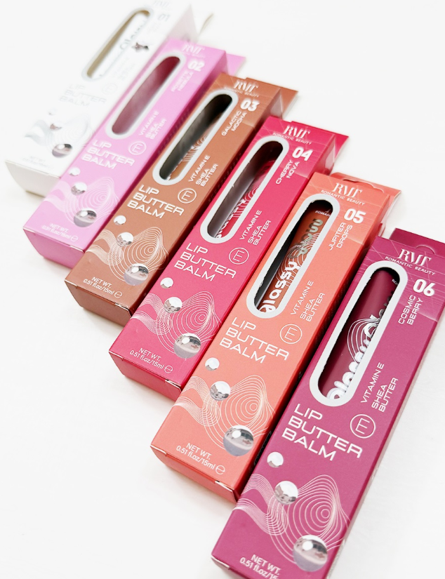 Six colorful boxes of love & repeat Vitamin E Lip Butter Balm, each showing a number and shade through a window, are arranged diagonally on a white surface.