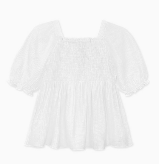 The Sweet Cotton Smocked Blouse by Cutie Patootie is a white, short-sleeved top featuring puffed sleeves, a smocked bodice, loose flared waist, square neckline, and lightweight textured fabric.