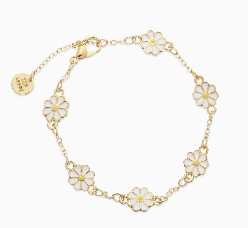 The Charm After Charm Bracelets by top trenz inc. is a gold chain bracelet with five white enamel daisy charms, evenly spaced, featuring a lobster clasp, adjustable extender, and a small round gold tag.