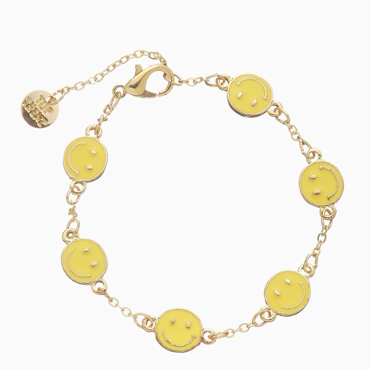 The Charm After Charm Bracelet by top trenz inc. is a gold chain with six yellow smiley face charms, spaced evenly, finished with a lobster clasp and an adjustable extender with a small round tag.