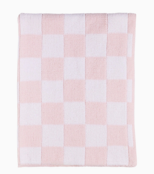 The living textiles Chenille Blanket - Pink Check features a soft, textured fabric in a light pink and white checkerboard pattern, neatly folded for a cozy touch.