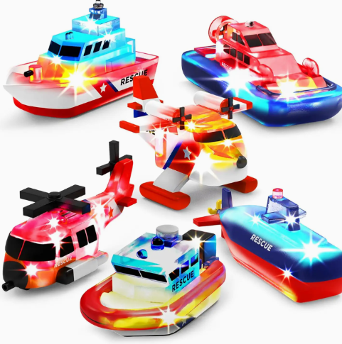 The TubWorks Tub Works® Ocean Rescue™ Vehicles Light Up Bath Toys 6 Pack features two boats, two helicopters, a hovercraft, and a submarine—all with bright flashing lights—arranged on a white background.