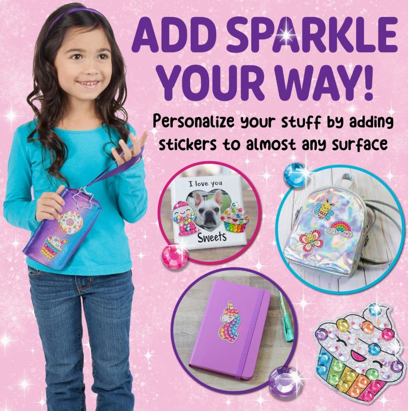 A smiling young girl holds a Big Gem Diamond Painting Stickers Mini Kit by Creativity For Kids. Text reads: Add sparkle your way! Personalize notebooks, cards, backpacks, and art with vibrant stickers on any surface.