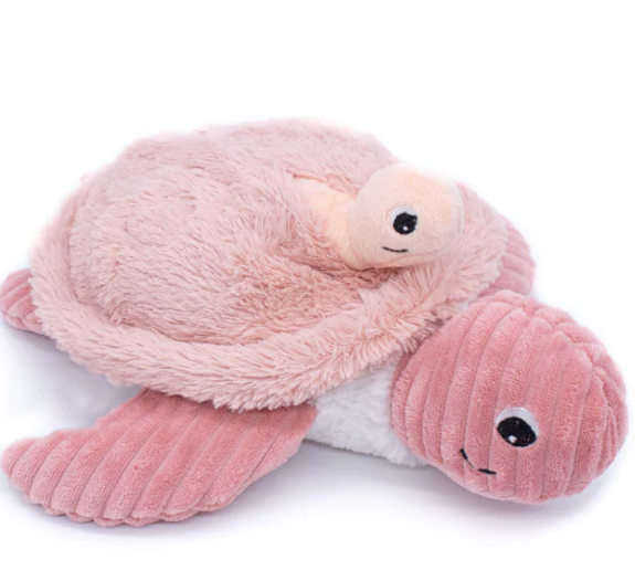 Triaction’s Turtle Mama with Baby - Pink is a soft plush toy featuring a pink mama turtle with stitched black eyes and a small baby turtle in a pocket on her back, shown lying on a white background.