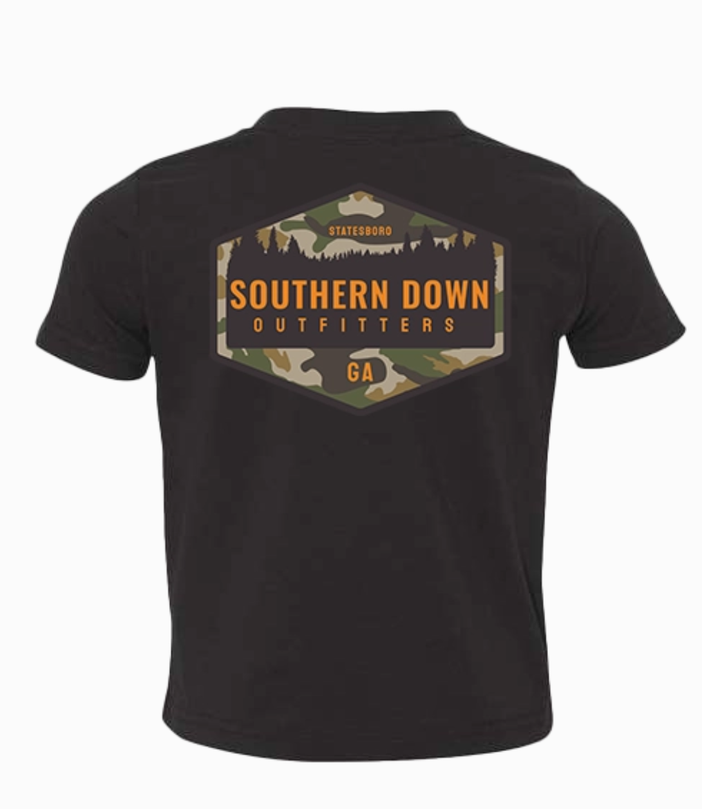 The Camo Logo Toddler Tee by Wild Trail Outfitters is a black t-shirt featuring a hexagonal camo logo on the back with "Wild Trail Outfitters" and "Statesboro, GA," plus tree silhouettes at the top.