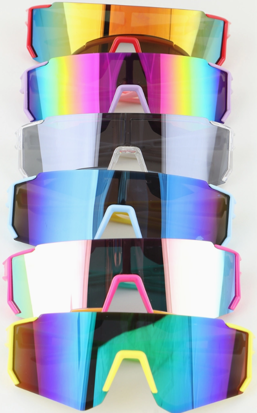 Six vibrant Two Toned Shield Sunglasses by 3AM BY H&D ACCESSORIES are stacked vertically, each pair featuring a large, wraparound, reflective lens with striking color gradients of yellow, blue, pink, and purple.