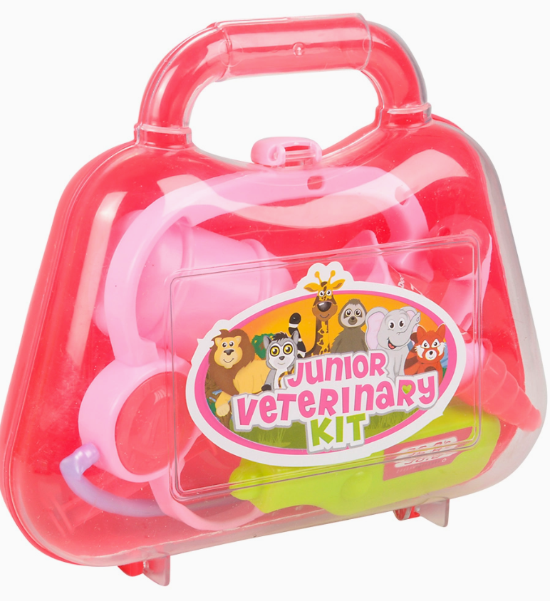 The Toy Network Safari Junior Vet Kit is a pink plastic case with cartoon animals on the label, containing toy medical tools for children.