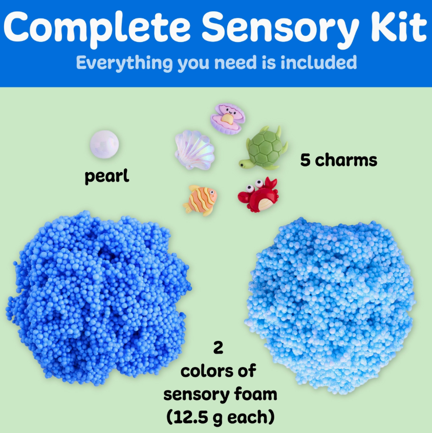 The Sensory Surprise Squishy Foam Bucket by Creativity For Kids includes two blue foams, five sea-themed charms (fish, shell, turtle, crab, star), and a pearl. Blue background label features product info.