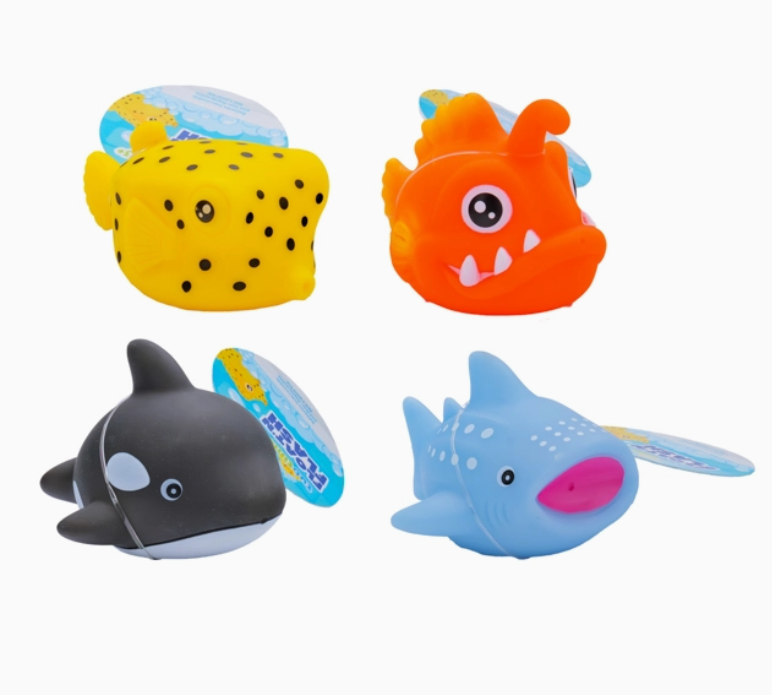 The Toy Smith Tub Time Float 'n Flash includes four colorful toy sea creatures: a yellow boxfish with black spots, an orange anglerfish with a fin, a black and white orca, and a light blue whale shark with spots and a pink mouth.