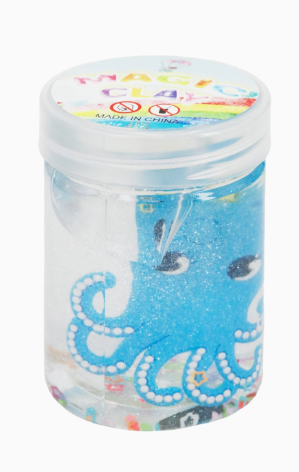 A clear plastic jar with a white lid from Capzone holds blue and white clay shaped like an octopus. The top label reads Marine Sea Animal Slime Mini Jar and shows it's made in China.