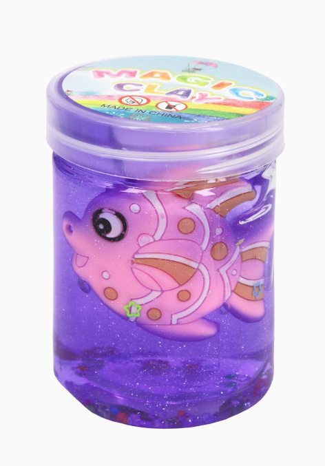 The Capzone Marine Sea Animal Slime Mini Jar is a clear plastic jar filled with purple glitter slime and a cute cartoon pink fish inside. The lid displays "Magic Clay" in colorful text and images.