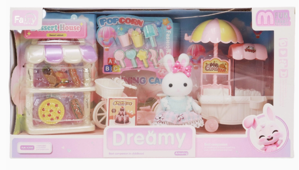 The Capzone Girls Mini Rabbit Play House set includes a white bunny plush, dessert house kiosk, popcorn and ice cream carts, plus pastel-colored accessories—all packed in a pink box labeled Dreamy.